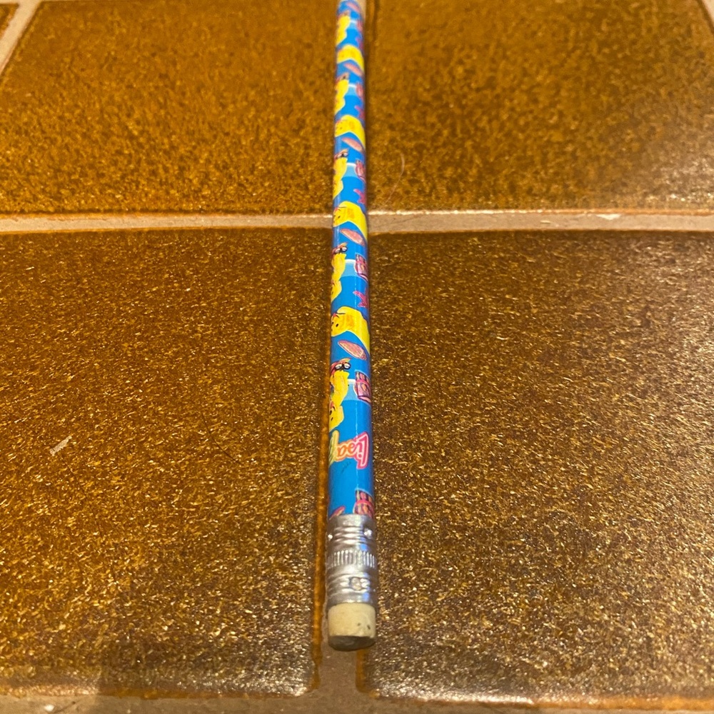 Lisa Frank Vintage Y2K Sharpened Blue Novelty Pencil with Yellow Design puppies